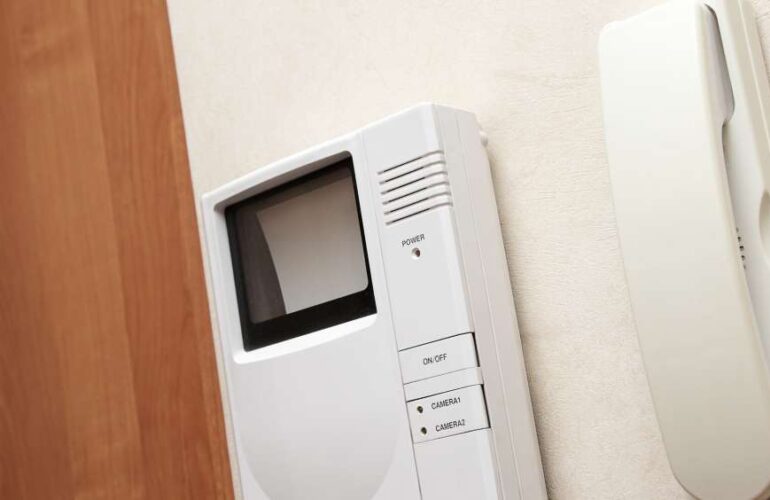 Video intercom system installed in an apartment building, allowing secure communication with visitors.